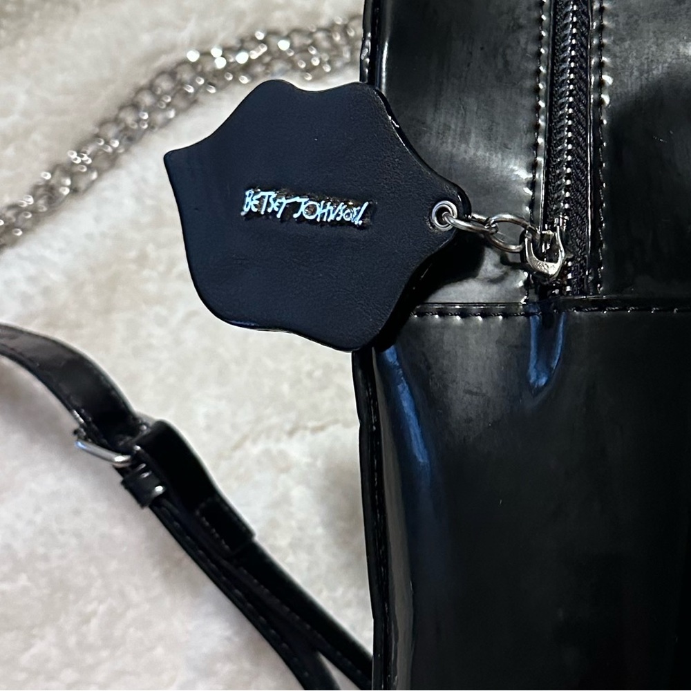 Betsey Johnson Black and Silver Crossbody Bag with Sleek Design
